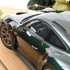 Porsche 911 GT3 RS 2022 Jetgrün metallic und Schwarz 1:12 Modellauto 127532 Norev